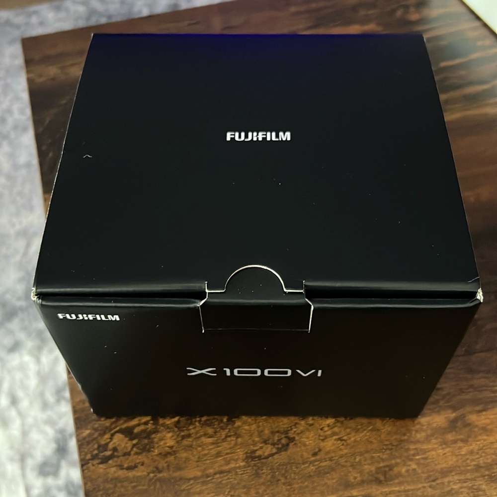 Fujifilm 100VI used once just like new. With screen protectors and filter.